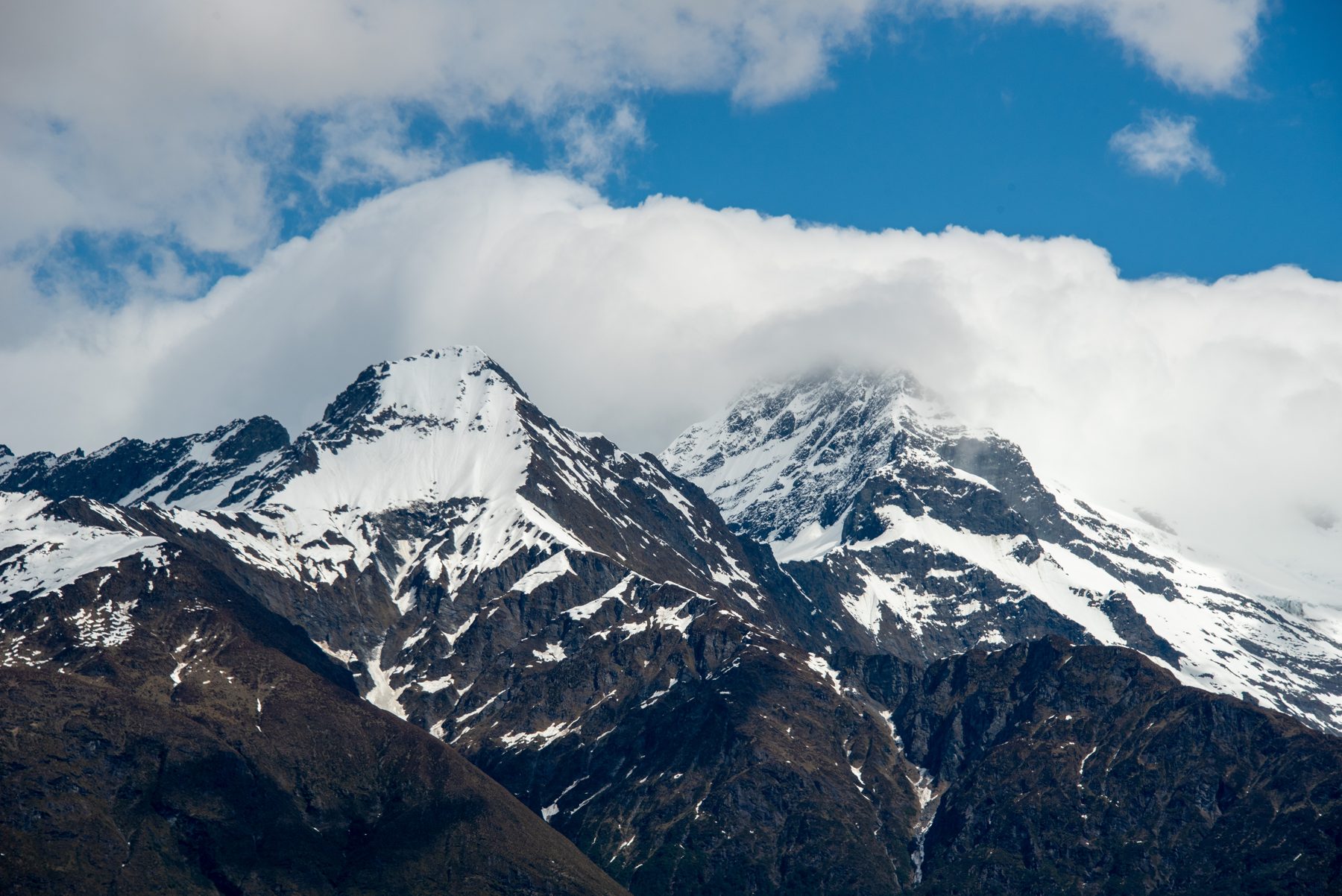 Tititea Mt Aspiring in cloud above the Matukituki Valley, Mount Aspiring National Park